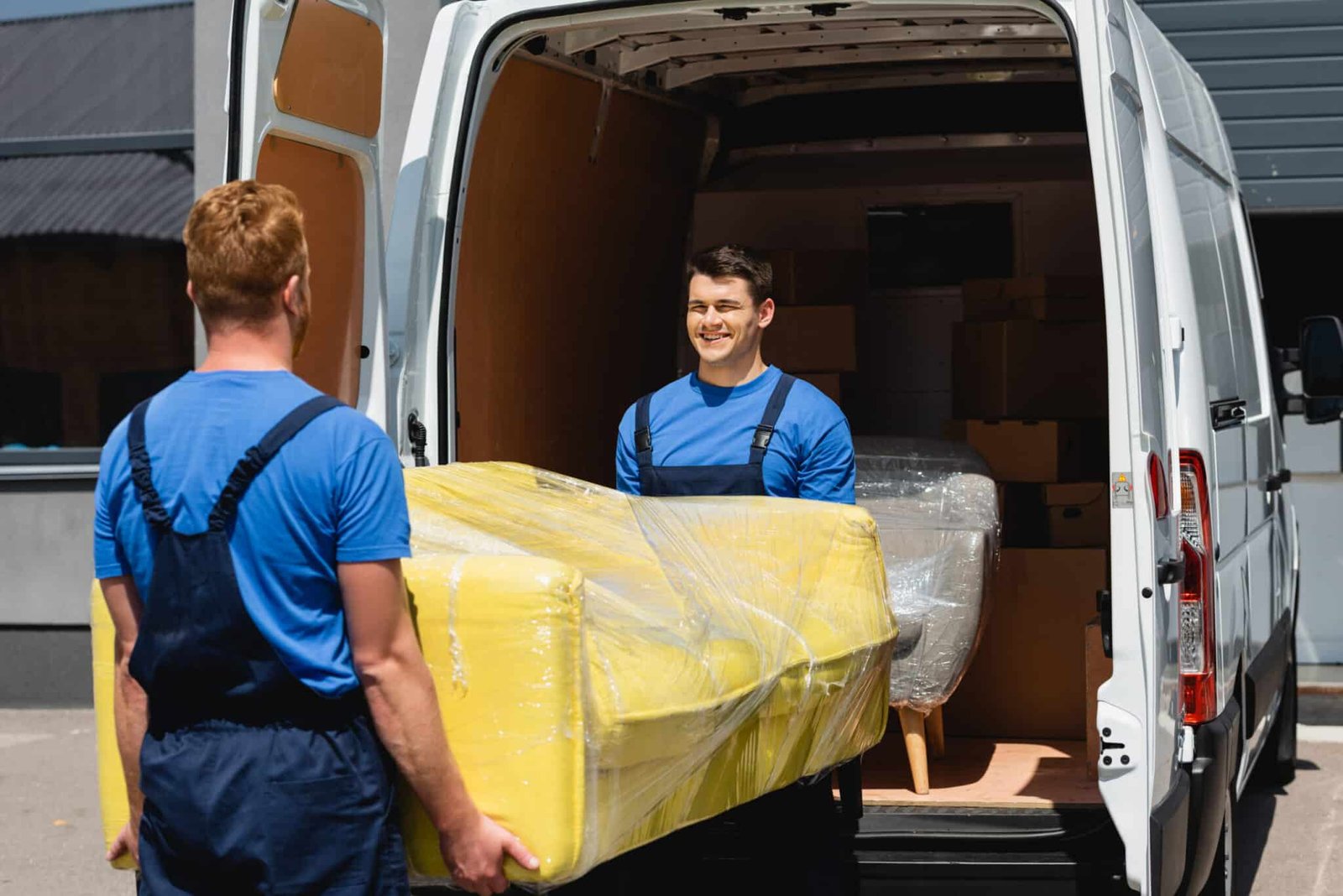 selective focus of movers holding sofa in stretch 2024 11 17 23 58 10 utc scaled
